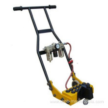 Reciprocating piston pneumatic deck scaler